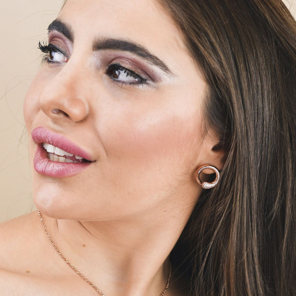 Shop online premium rose gold plated wrap earrings with drop-shaped pavé cubic zirconia detailing for elegant modern styling.