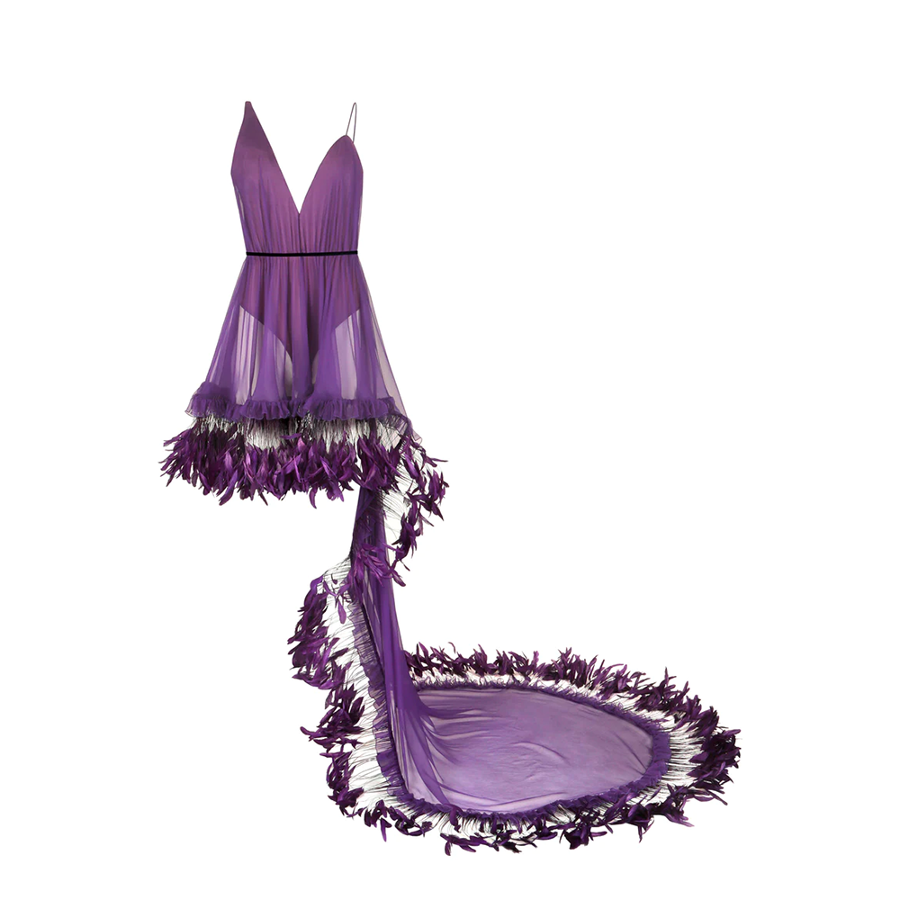 A purple silk chiffon mini-dress with an integrated scarf train and ruffled coq plumes.