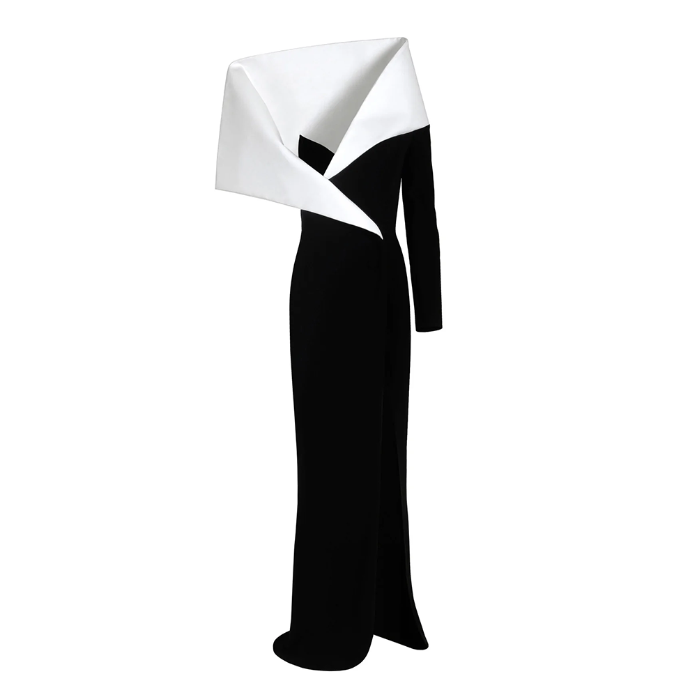 A black silk crepe coat dress highlighted with a structured white collar.