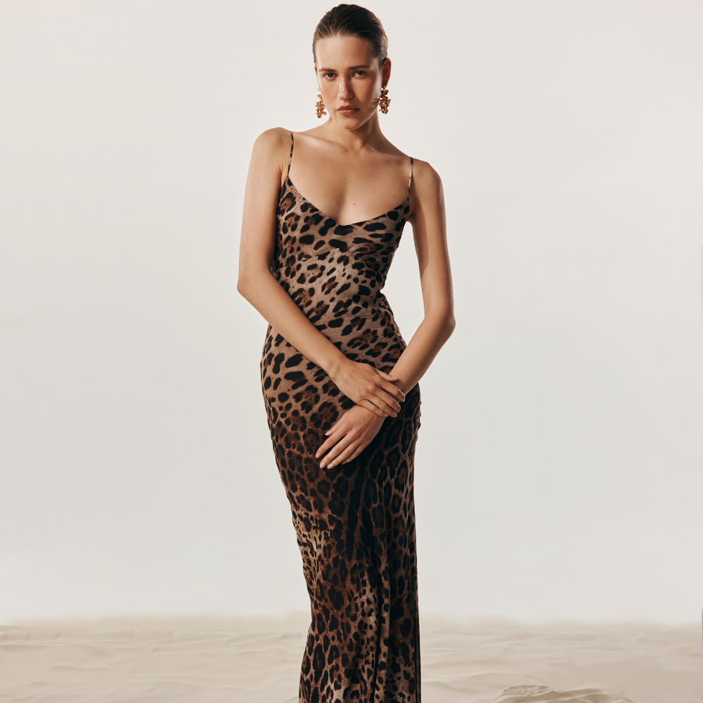 Elegant silk dress with a perfect body-hugging fit for a sleek, refined look. Shop now at our exclusive clothing website.