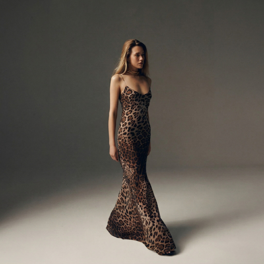 Elegant silk dress with a perfect body-hugging fit for a sleek, refined look. Shop now at our exclusive clothing website.