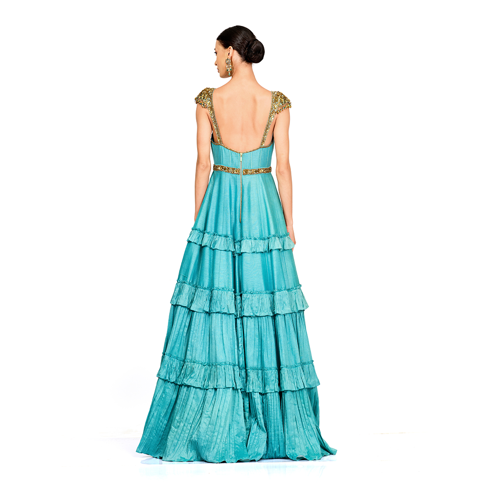 Corset gown l Embroidered signature belt l Embroidered straps with tassels l Bottom Frills l Centre Back Zip Closure.