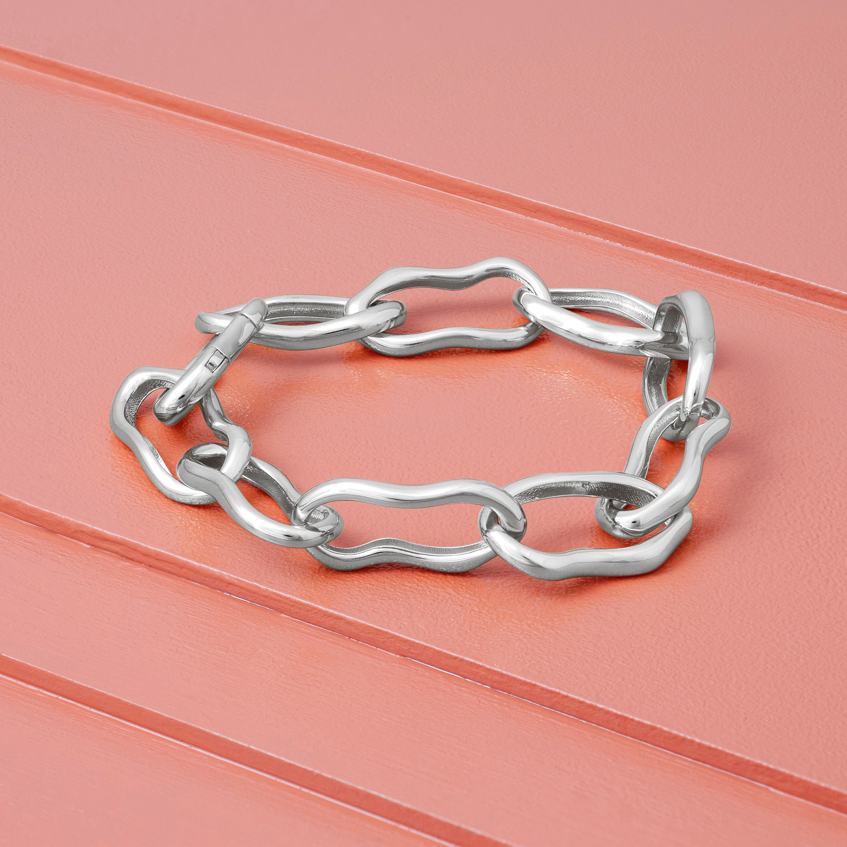 Enhance your look with our elegant Silver Molten Chain Bracelet. Visit our Accessorize Shop Online and get yours today! Shop Now!