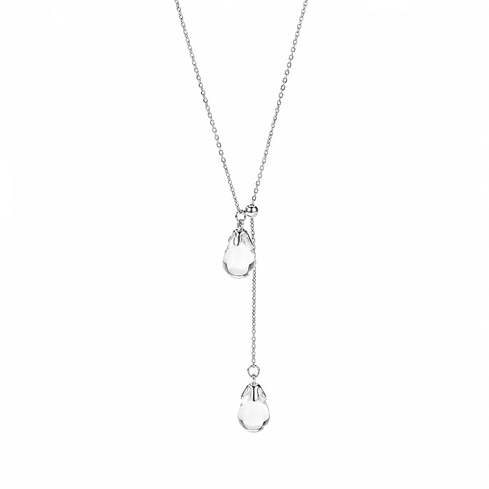 Discover the Silver Rain Lariat Necklace at The Luxe Maison, featuring crystal-clear glass pendants, a delicate chain, and an adjustable stainless steel clasp.