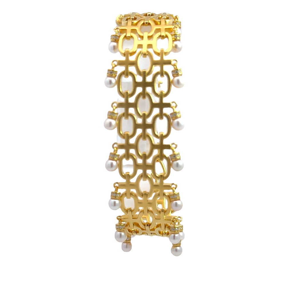 Sterling silver 18k gold-dipped bracelet with freshwater pearls and cubic zirconia accents for a clean timeless style. Shop premium jewelry online.