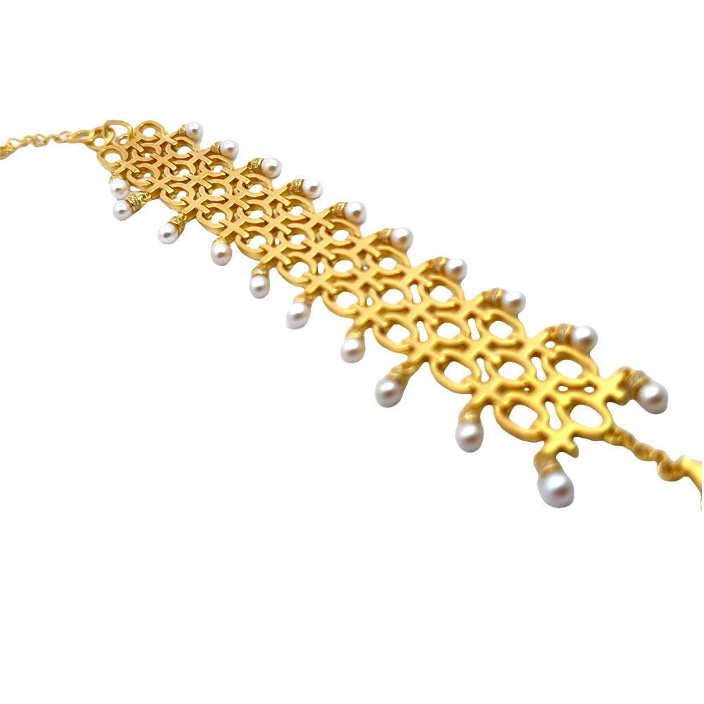 Sterling silver 18k gold-dipped bracelet with freshwater pearls and cubic zirconia accents for a clean timeless style. Shop premium jewelry online.