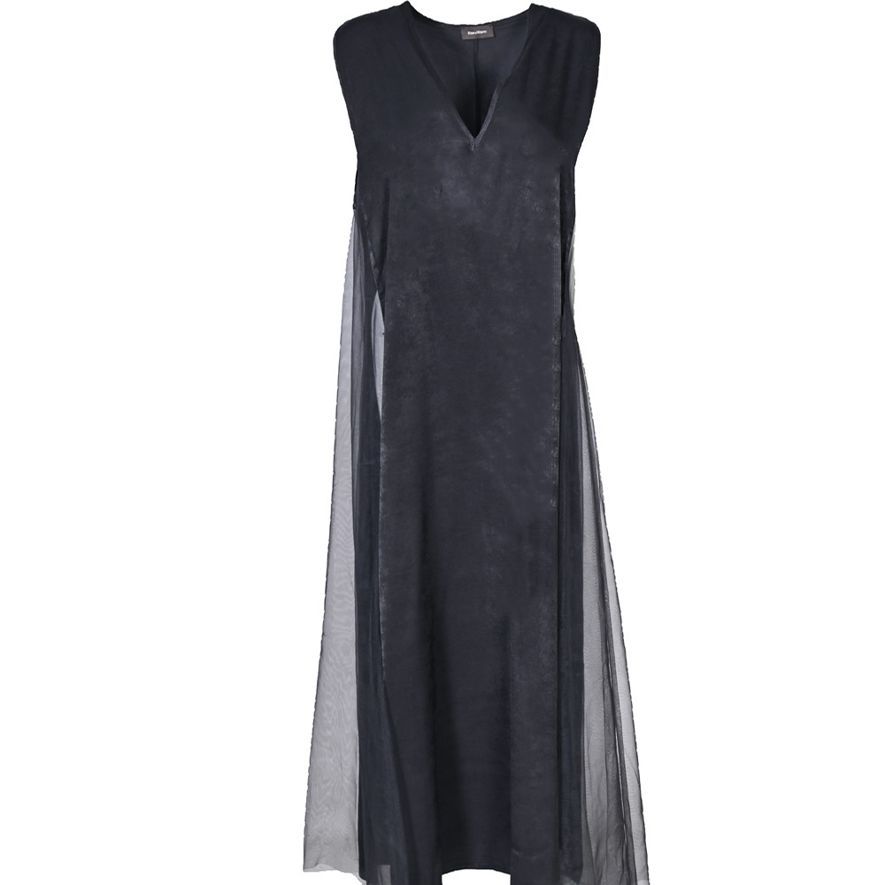 Sirocco is the name of the dress. It features a long and loose silhouette with a deep V-neckline.