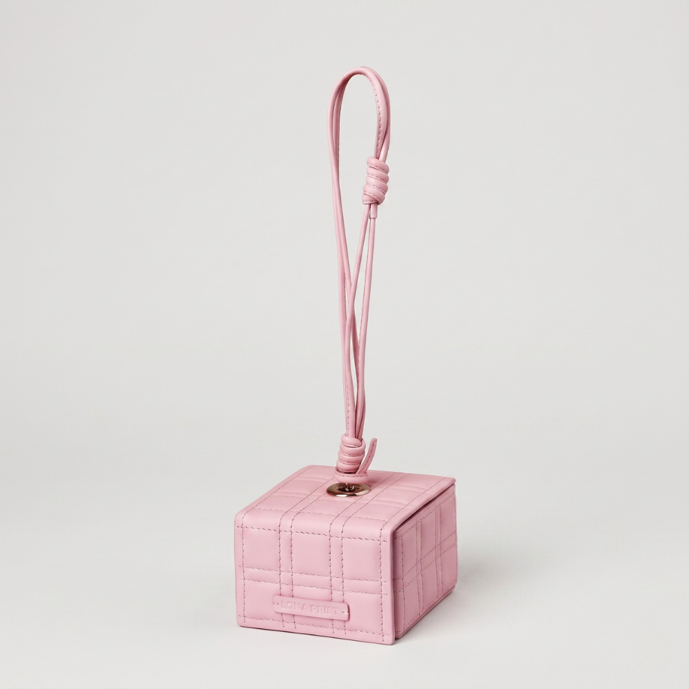 Genuine leather handbag with magnetic closure and silver hardware. Shop online from our curated edit of premium fashion.