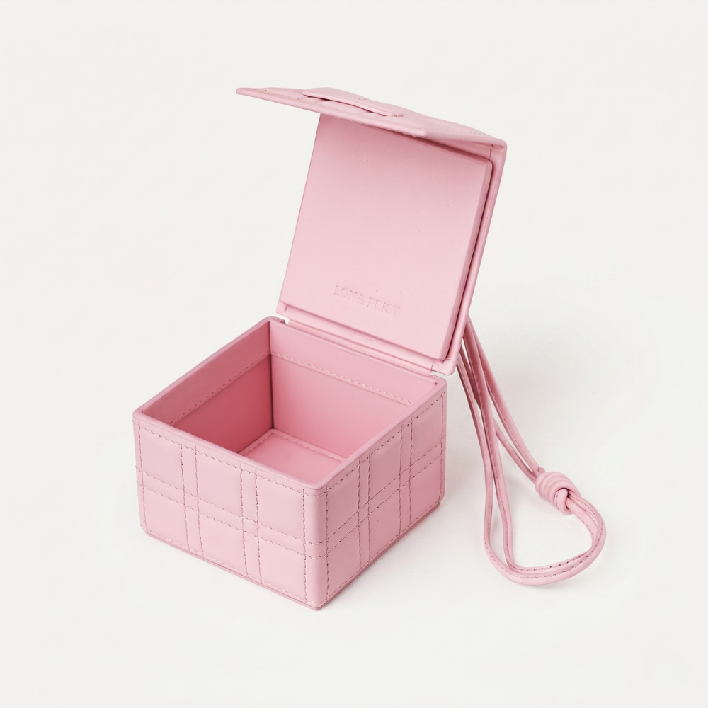 Genuine leather handbag with magnetic closure and silver hardware. Shop online from our curated edit of premium fashion.