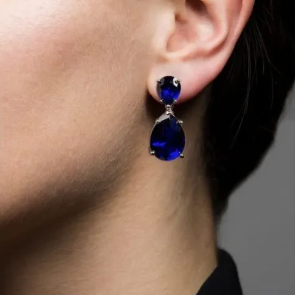 6CTTW double pear cubic zirconia drop earrings. Pierced ear set in rhodium-plated brass.