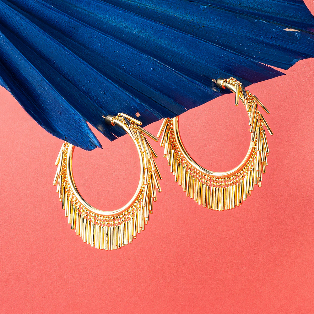 Elevate your style with our Small Gold Tassel Hoop Earrings, the perfect luxury women accessories for any outfit. Shop Now!