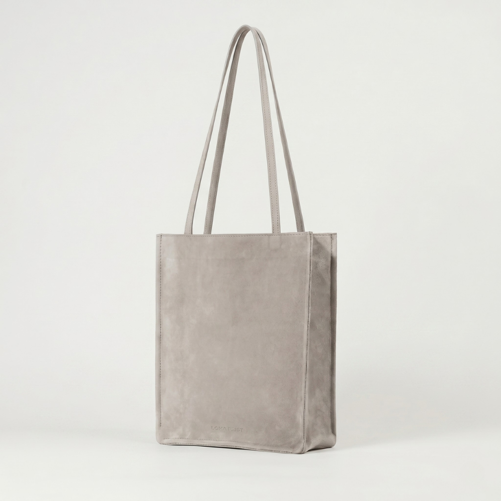 Compact suede tote bag with soft lining, ideal for daily essentials. Shop online from our curated edit of premium fashion.