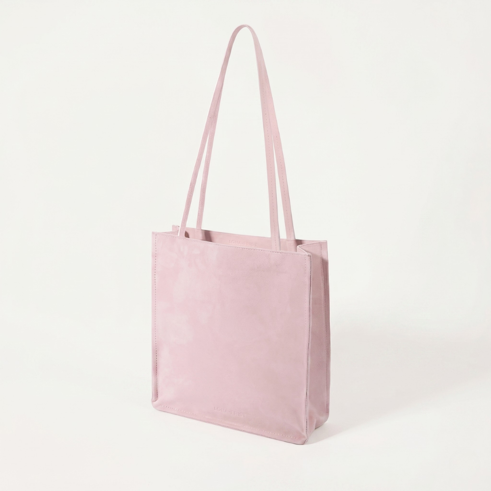 Genuine suede tote bag with soft lining and shoulder carry design. Shop online from our curated edit of premium fashion.