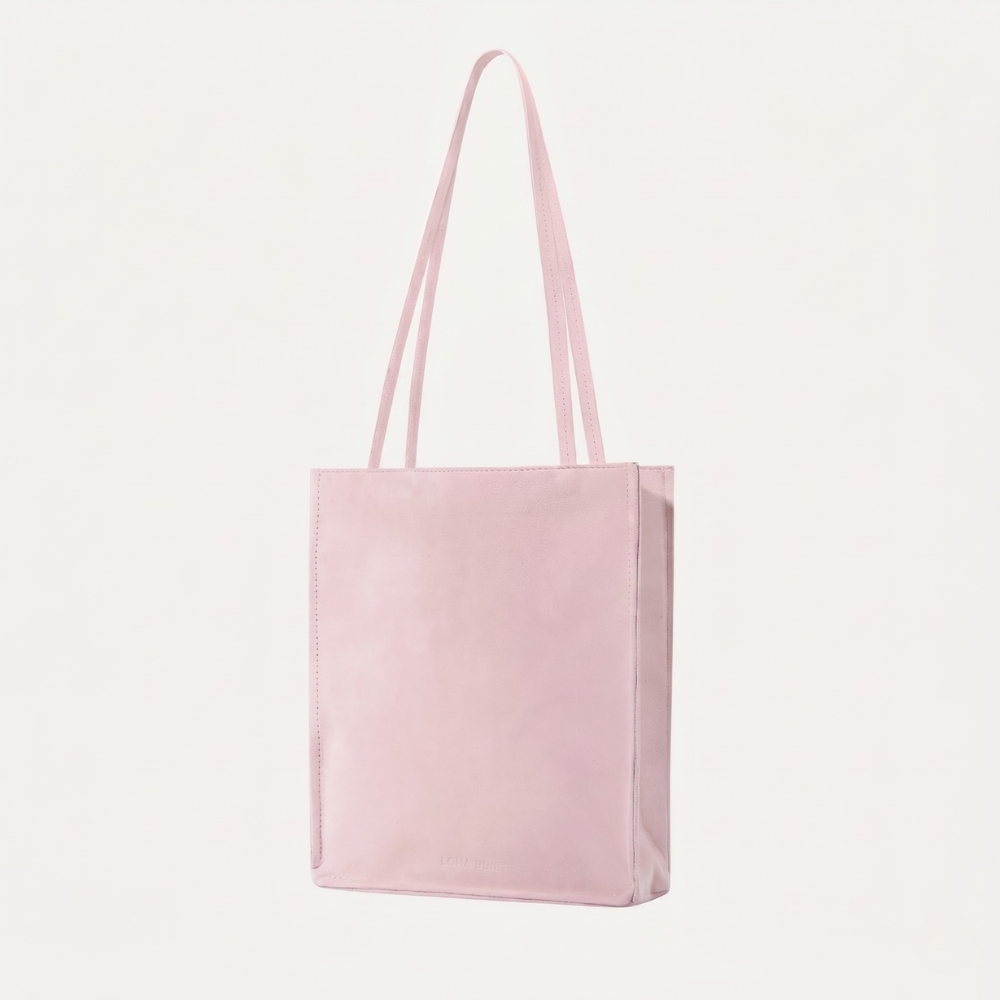Genuine suede tote bag with soft lining and shoulder carry design. Shop online from our curated edit of premium fashion.