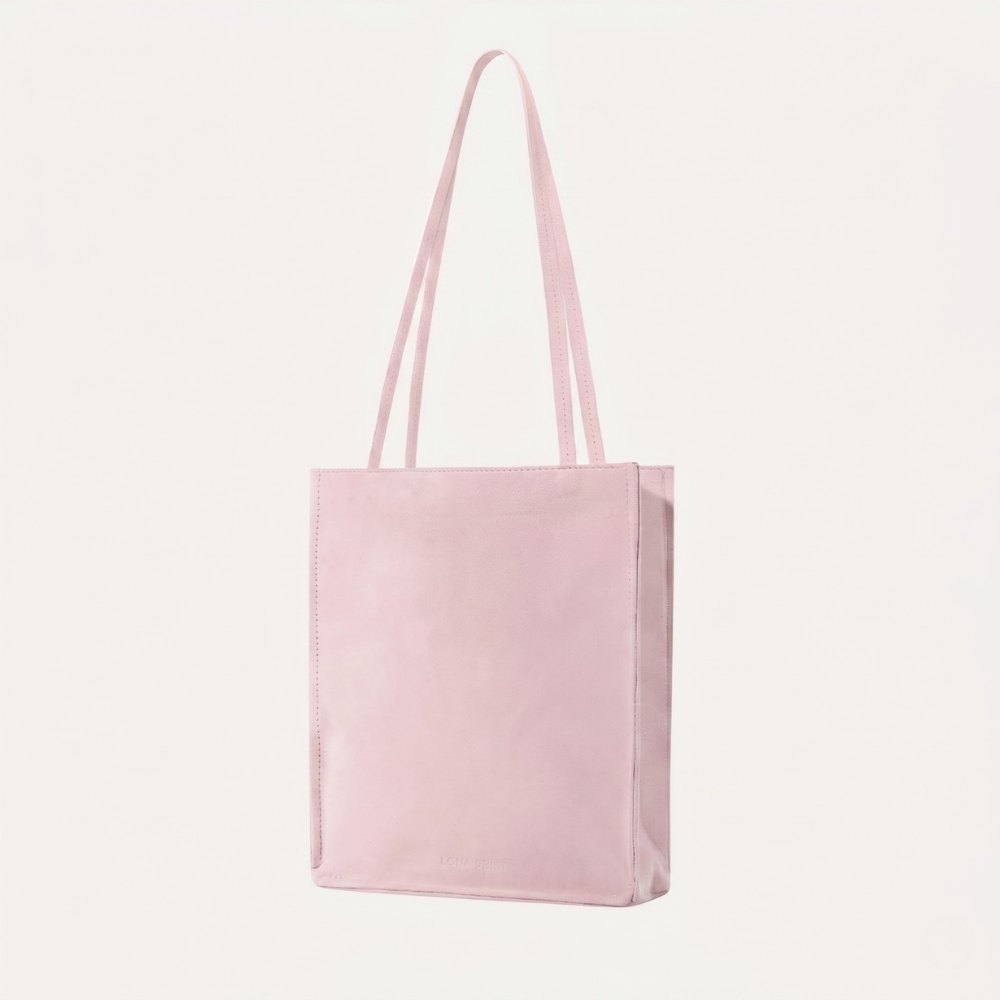 Genuine suede tote bag with soft lining and shoulder carry design. Shop online from our curated edit of premium fashion.