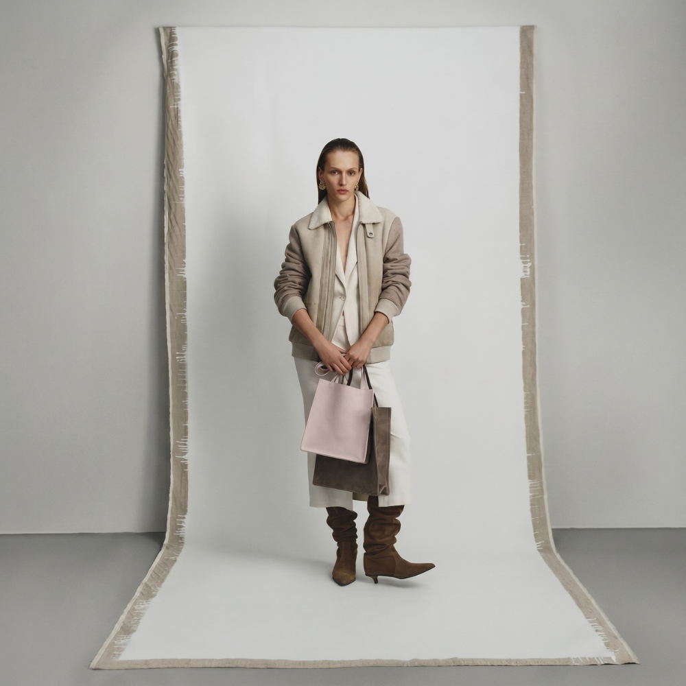 Genuine suede tote bag with soft lining and shoulder carry design. Shop online from our curated edit of premium fashion.