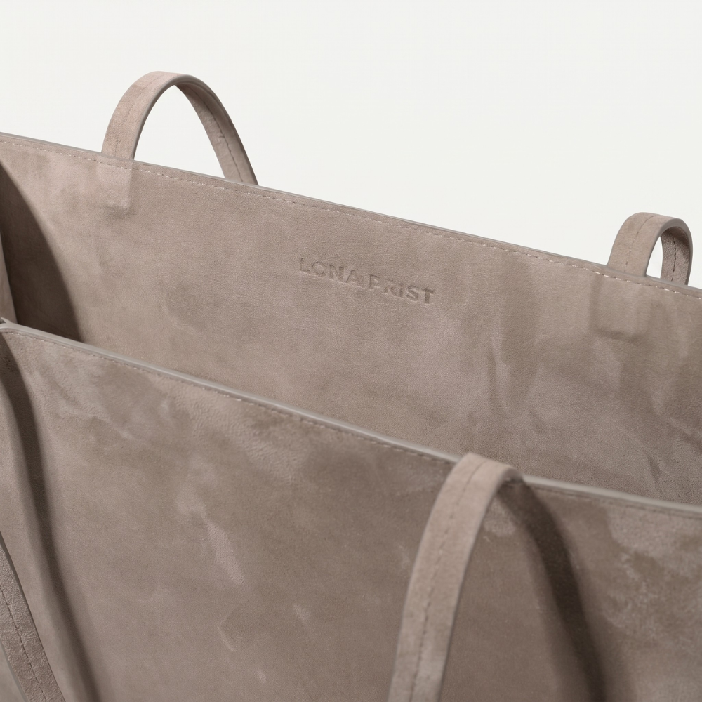 Small suede tote bag with soft lining, perfect for everyday use. Shop online from our curated edit of premium fashion.
