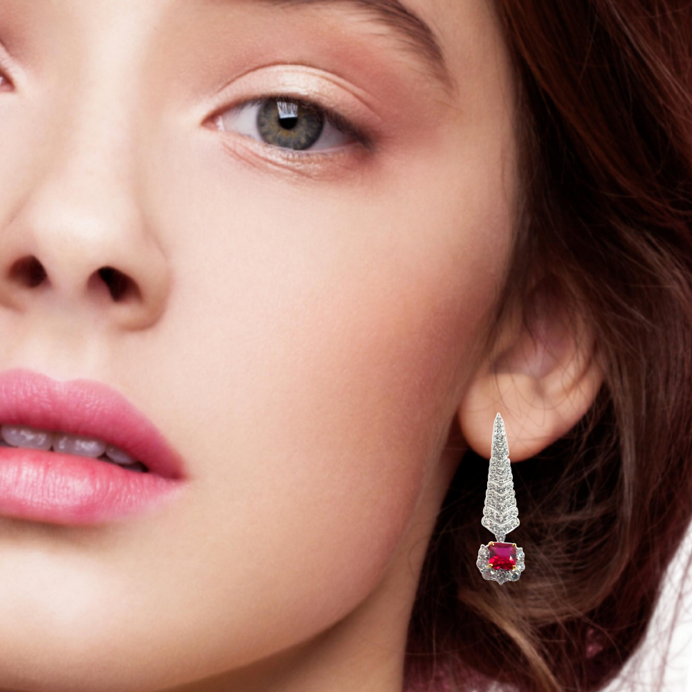 Shop online premium rhodium plated ruby shoulder duster earrings with sparkling cubic zirconia stones.