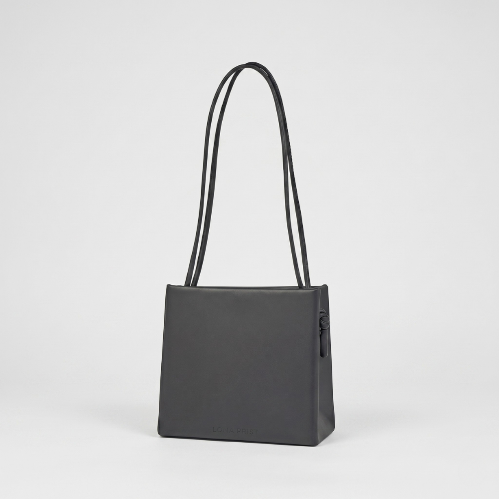 Premium leather bag with versatile handles and flap closure, pre order. Shop online from our curated edit of premium fashion.