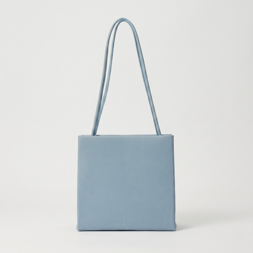 Genuine leather bag with flap closure, silver hardware and back pocket. Shop online from our curated edit of premium fashion.
