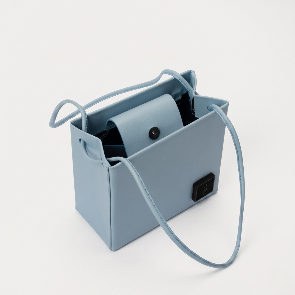 Genuine leather bag with flap closure, silver hardware and back pocket. Shop online from our curated edit of premium fashion.