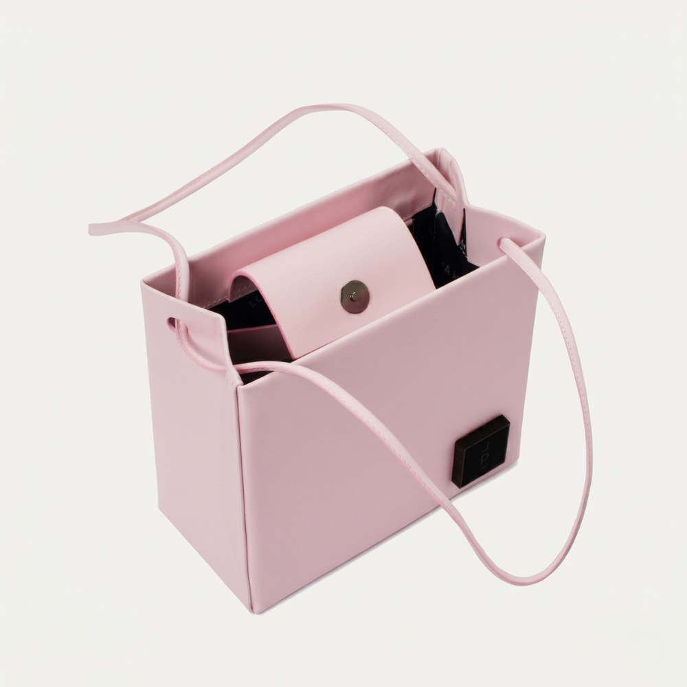 Genuine leather bag with silver hardware and flap closure, perfect for everyday use. Shop online from our curated edit of premium fashion.