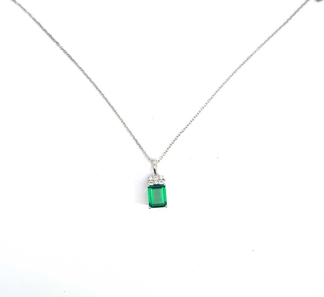 Shop online premium sterling silver emerald necklace with sparkling cubic zirconia stones.