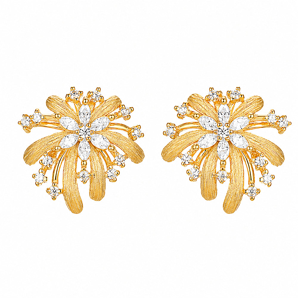 Discover the Starburst Celebration Earrings at The Luxe Maison, featuring marquise-cut zircon, sparkling zircon accents, and hand-brushed gold vermeil petals for a radiant, elegant look perfect for weddings, festive occasions, and special celebrations.