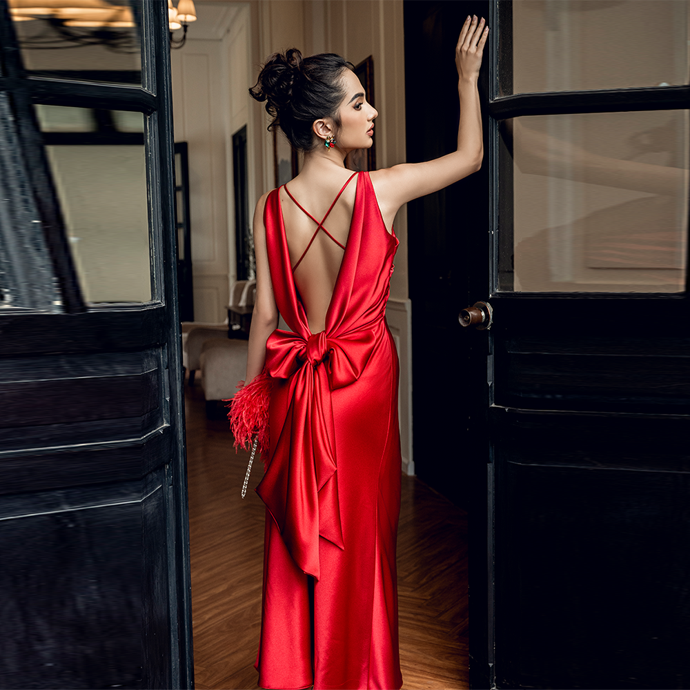 Elegant backless red silk dress features a sleek, figure-hugging design perfect for any occasion. Shop dress online to add luxury to your wardrobe!