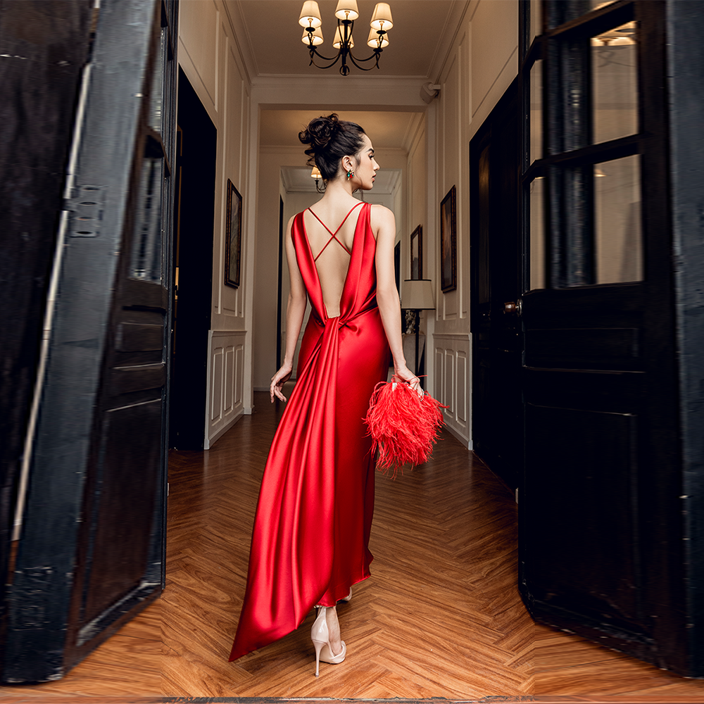 Elegant backless red silk dress features a sleek, figure-hugging design perfect for any occasion. Shop dress online to add luxury to your wardrobe!