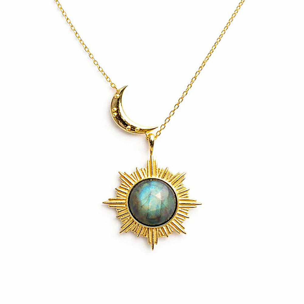 Discover the Sun and Moon Labradorite Necklace at The Luxe Maison, featuring a natural labradorite pendant with captivating flashes of blue, green, and gold. Inspired by the celestial balance of the sun and moon, this mystical necklace combines symbolic elegance with the unique beauty of natural gemstones for a distinctive everyday or statement look.