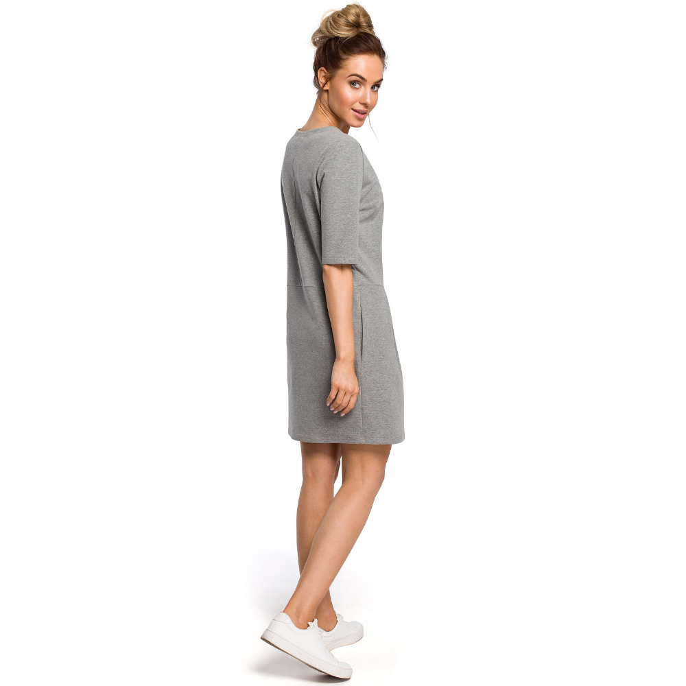 Sweat knit, dropped waist with short sleeves, decorative bow, above knee dress.