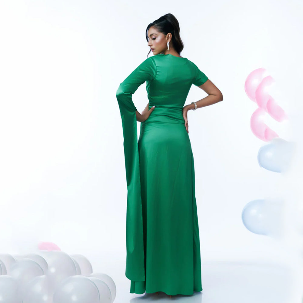 Green maternity dress with ruching and high neckline, perfect for events. Shop online from our curated edit of premium fashion.