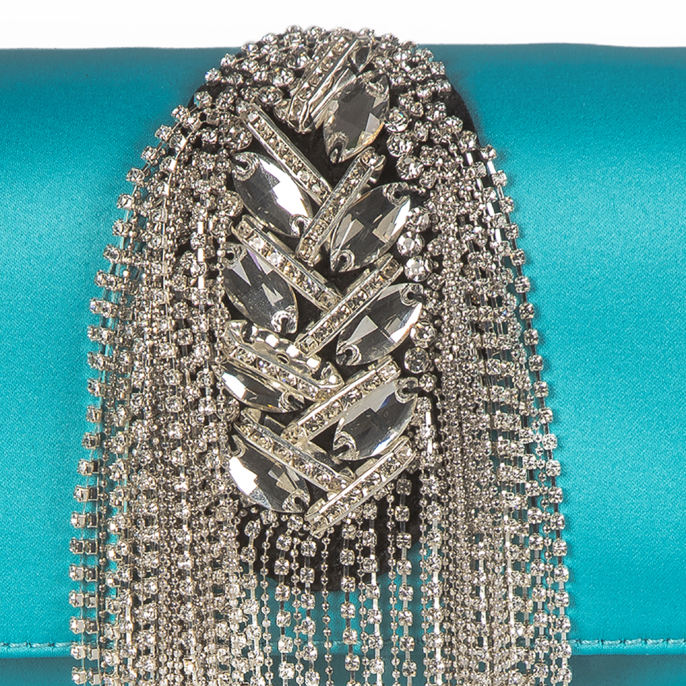 Add instant glamour to any occasion with our convertible clutch bag in turquoise satin. 