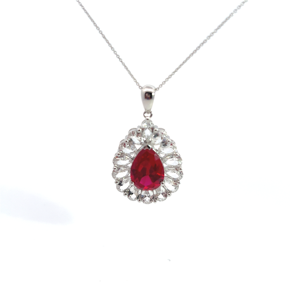 Shop online premium sterling silver tear drop ruby pendant necklace with elegant zirconia detailing.