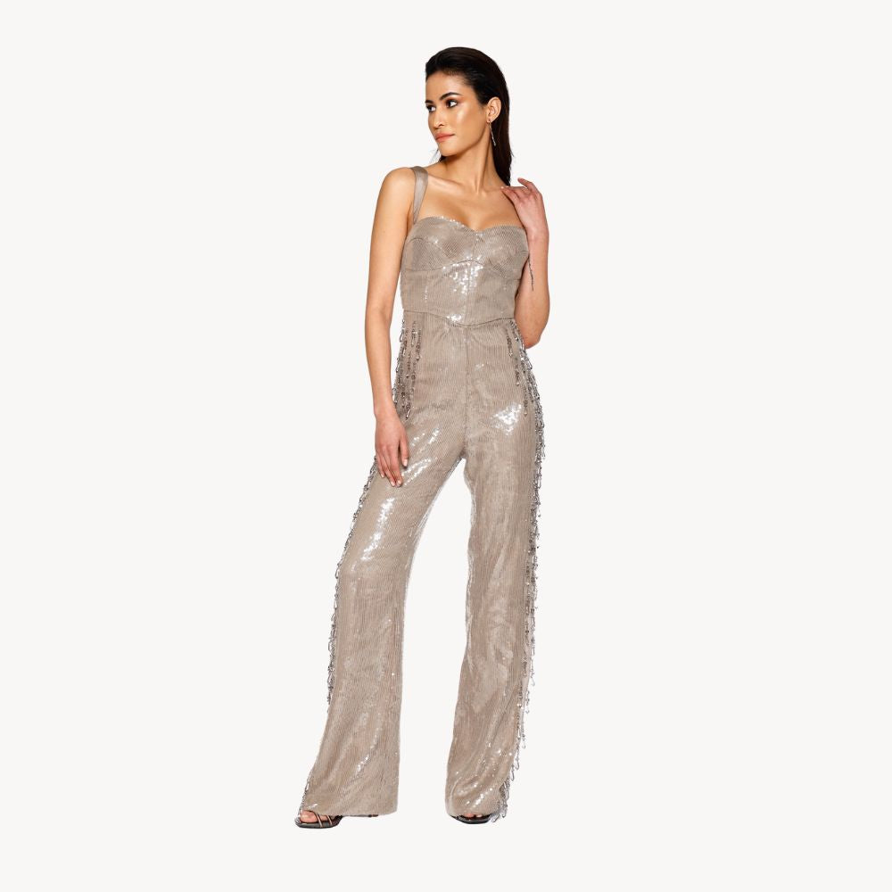 Shop online from our exclusive website. Discover the Teardrop Crystal Jumpsuit, hand-embroidered with sequins and teardrop crystals for an elevated evening look.