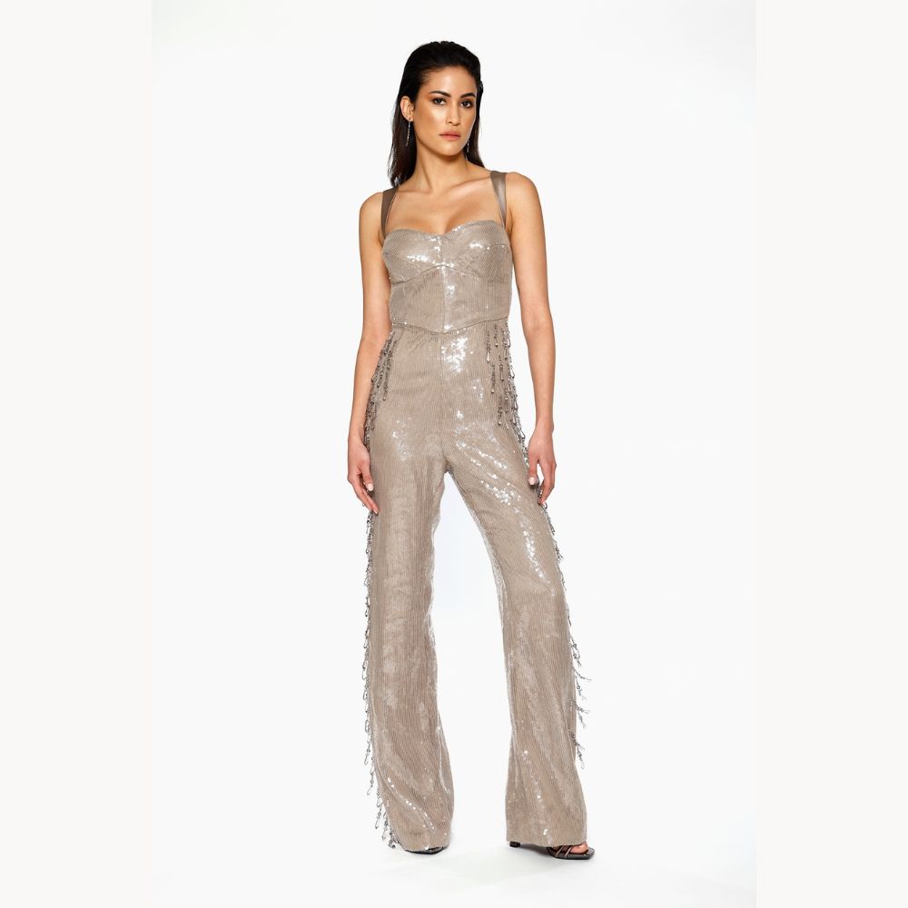 Shop online from our exclusive website. Discover the Teardrop Crystal Jumpsuit, hand-embroidered with sequins and teardrop crystals for an elevated evening look.