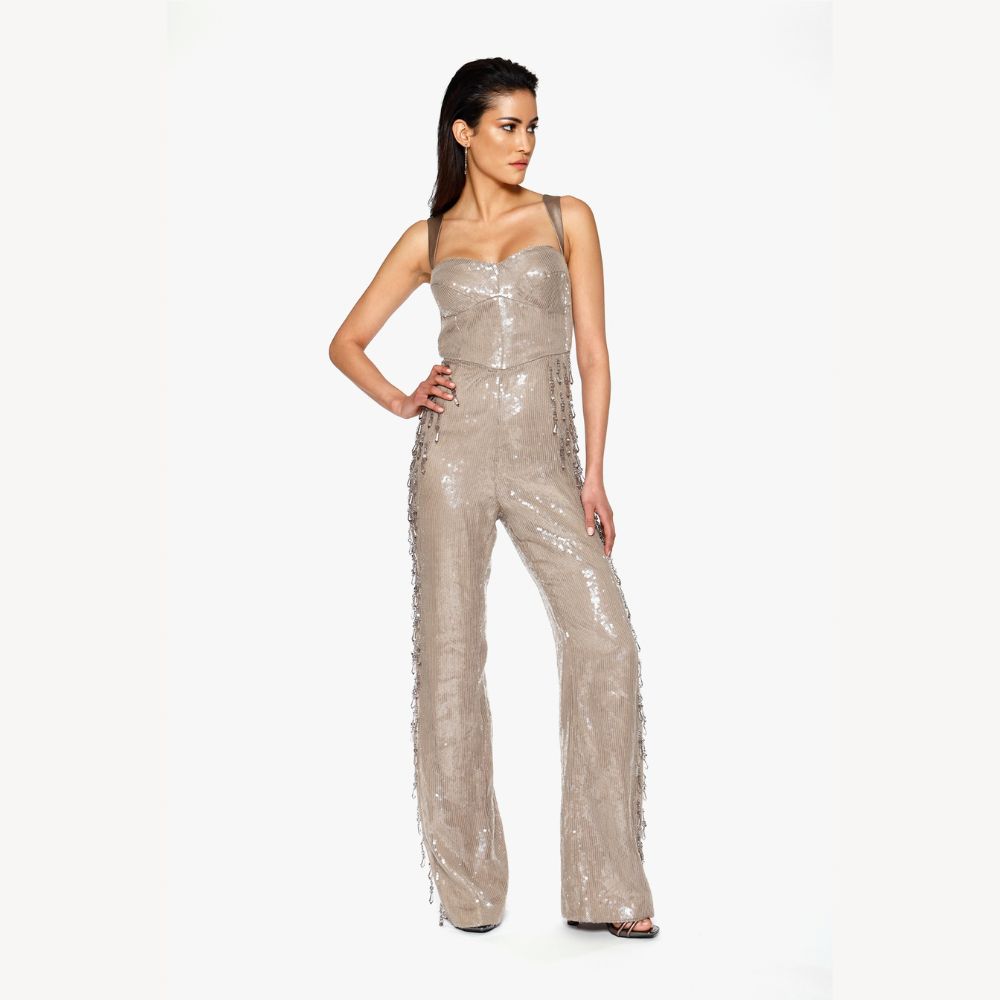 Shop online from our exclusive website. Discover the Teardrop Crystal Jumpsuit, hand-embroidered with sequins and teardrop crystals for an elevated evening look.