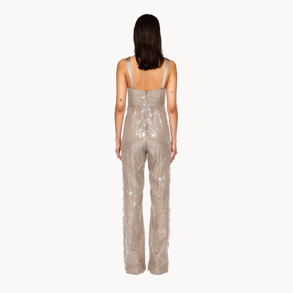 Shop online from our exclusive website. Discover the Teardrop Crystal Jumpsuit, hand-embroidered with sequins and teardrop crystals for an elevated evening look.