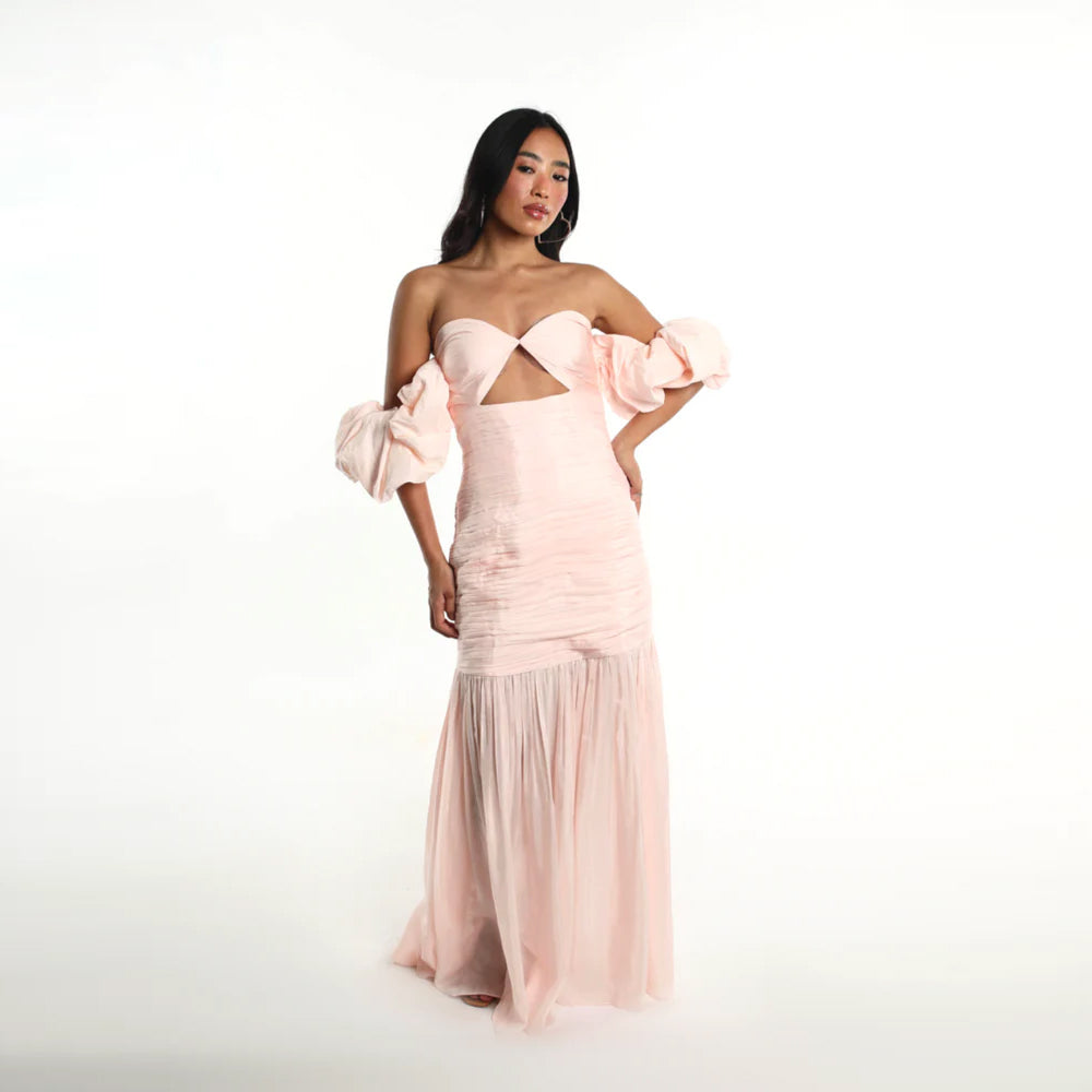Blush off shoulder dress with puff sleeves and breezy skirt, perfect for parties. Shop online from our curated edit of premium fashion.