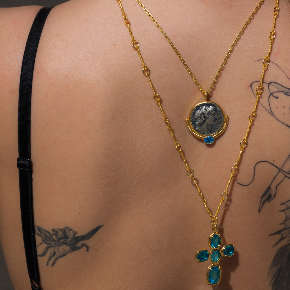 Explore our latest women's jewellery collection with The Alexander Coin pendant with 22K Gold Vermeil cast & an Aquamarine gemstone. Shop now!