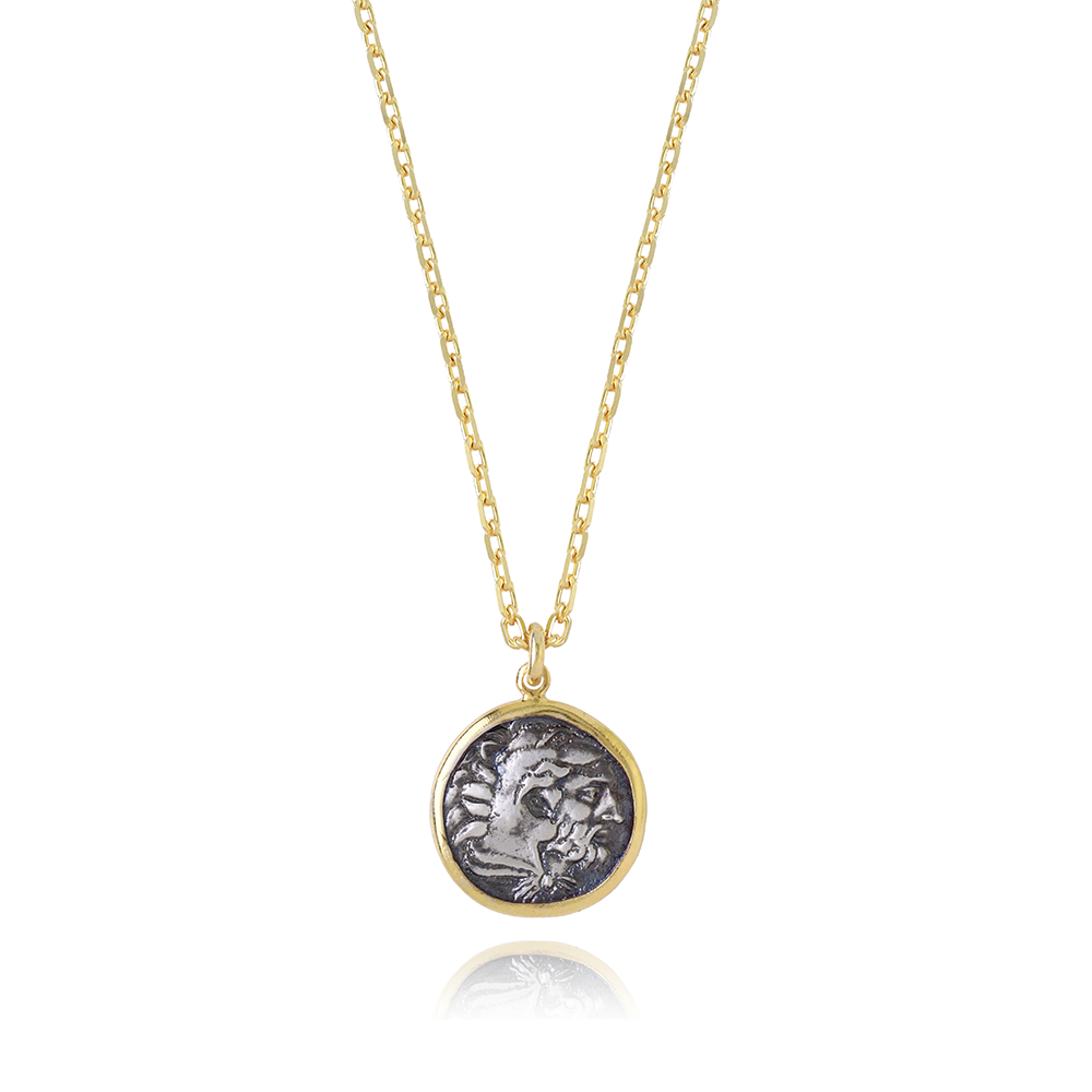 Amyntas Coin Pendant with a 22K Gold Vermeil frame surrounding the coin. Explore the finest jewellery from our curation of women accessories. Shop now!