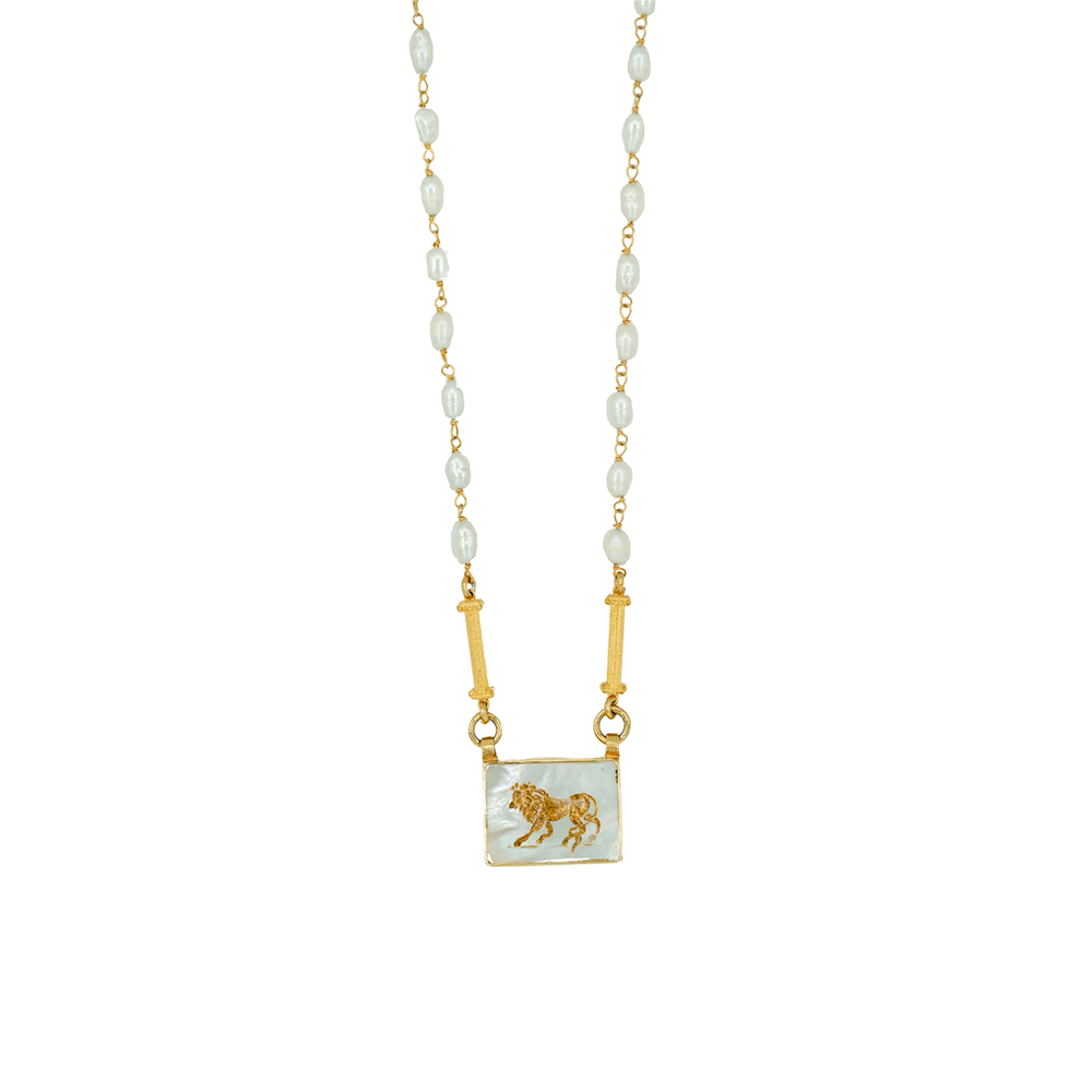 Shop the Aslan III Necklace adorned with sea pearls, and a lion engraving. Get this classic design from our jewellery collection for women. Shop now!