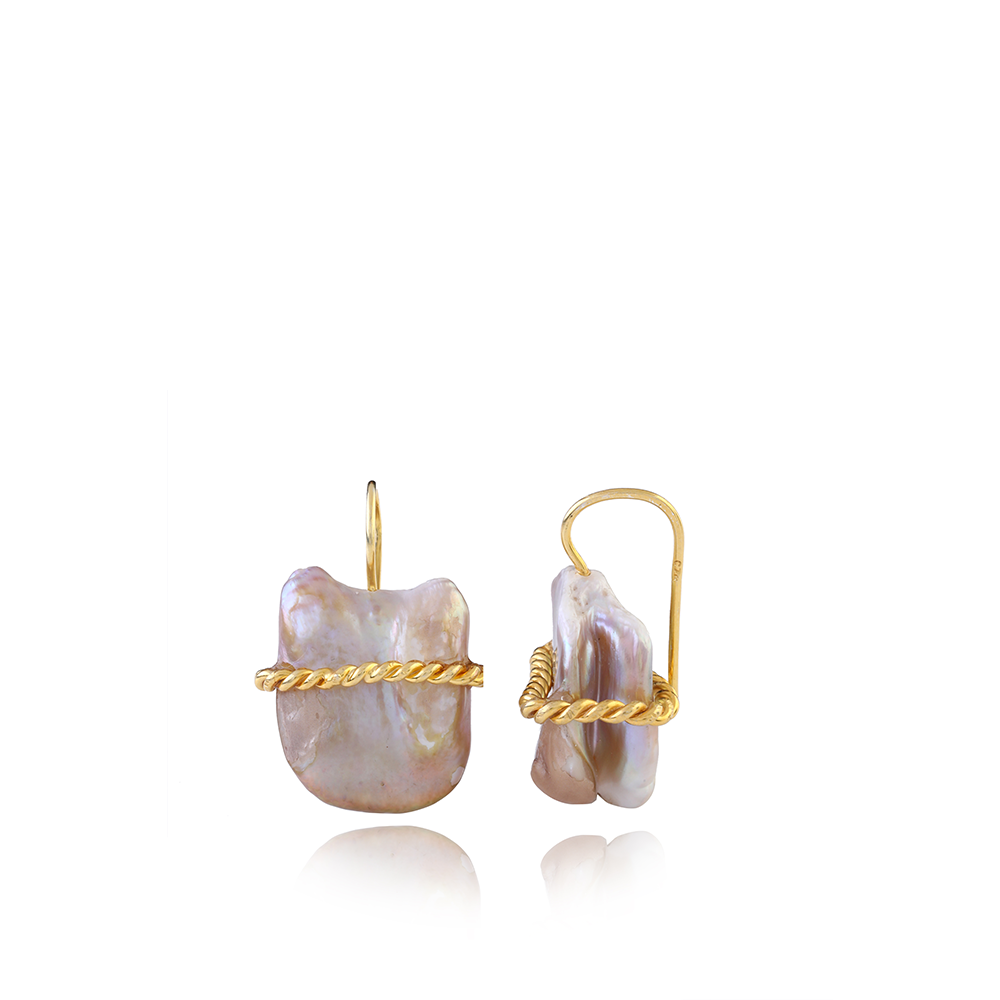 Shop the Diana Baroque Pearl Earrings surrounded by a handcrafted crown in 22K Gold Vermeil from our curation of handcrafted jewellery. Shop now!