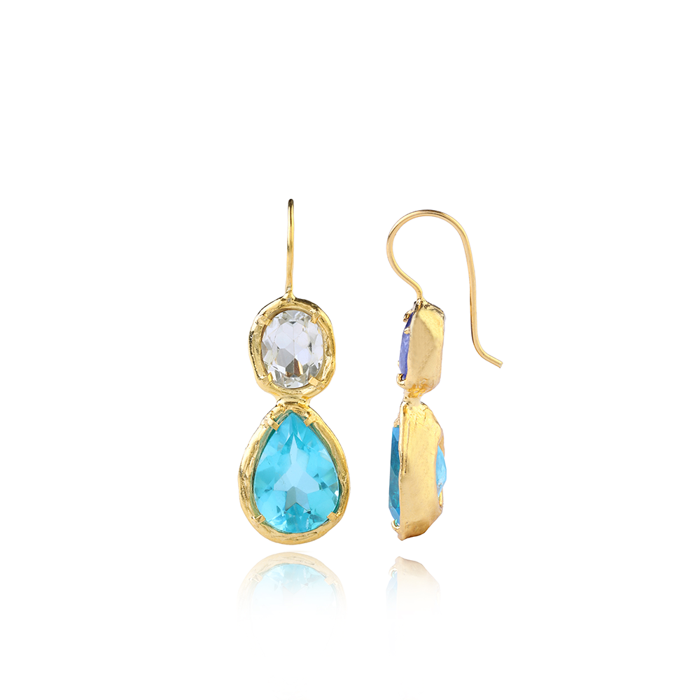 The Drop Earrings with 22K Gold Vermeil surrounding drop-shaped Blue Topaz with Tanzanite & Zircon attached is exclusively on Luxe Maison. Shop now!