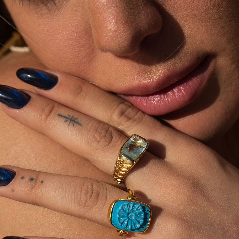 Flourish Ring is hand sculpted with 22K Gold Vermeil & Turquoise gemstone. Elegant piece from our curation of designer accessories for women. Shop now!