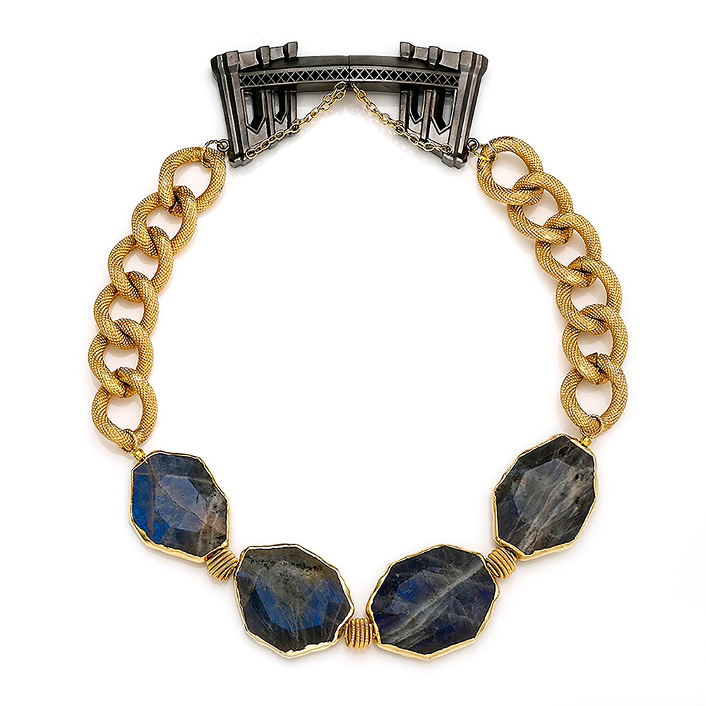 The Gotham Nights Necklace showcases New York City at night.The textured and beaded chain is bold and charming.