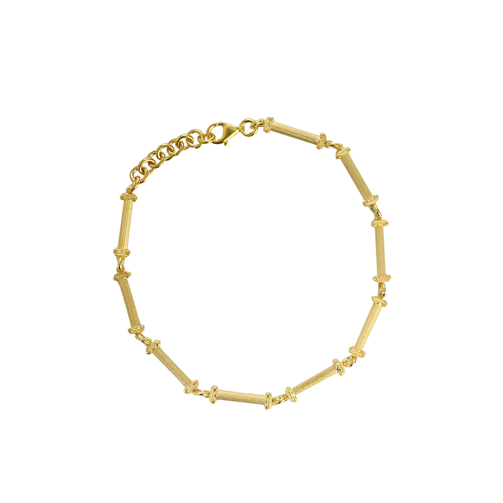 Ionic Bracelet in 22K Gold Vermeil is inspired by Temple of Athena Nike, an Ionic temple built around 420 BC. Explore elegant jewellery online. Shop now!