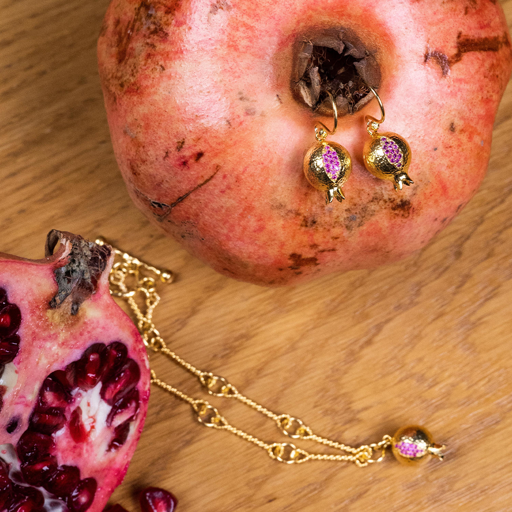 The Pomona Necklace’s charm from 22K Gold Vermeil and Red Garnet. Explore from our collection of Red Garnet jewellery collection. Shop now!