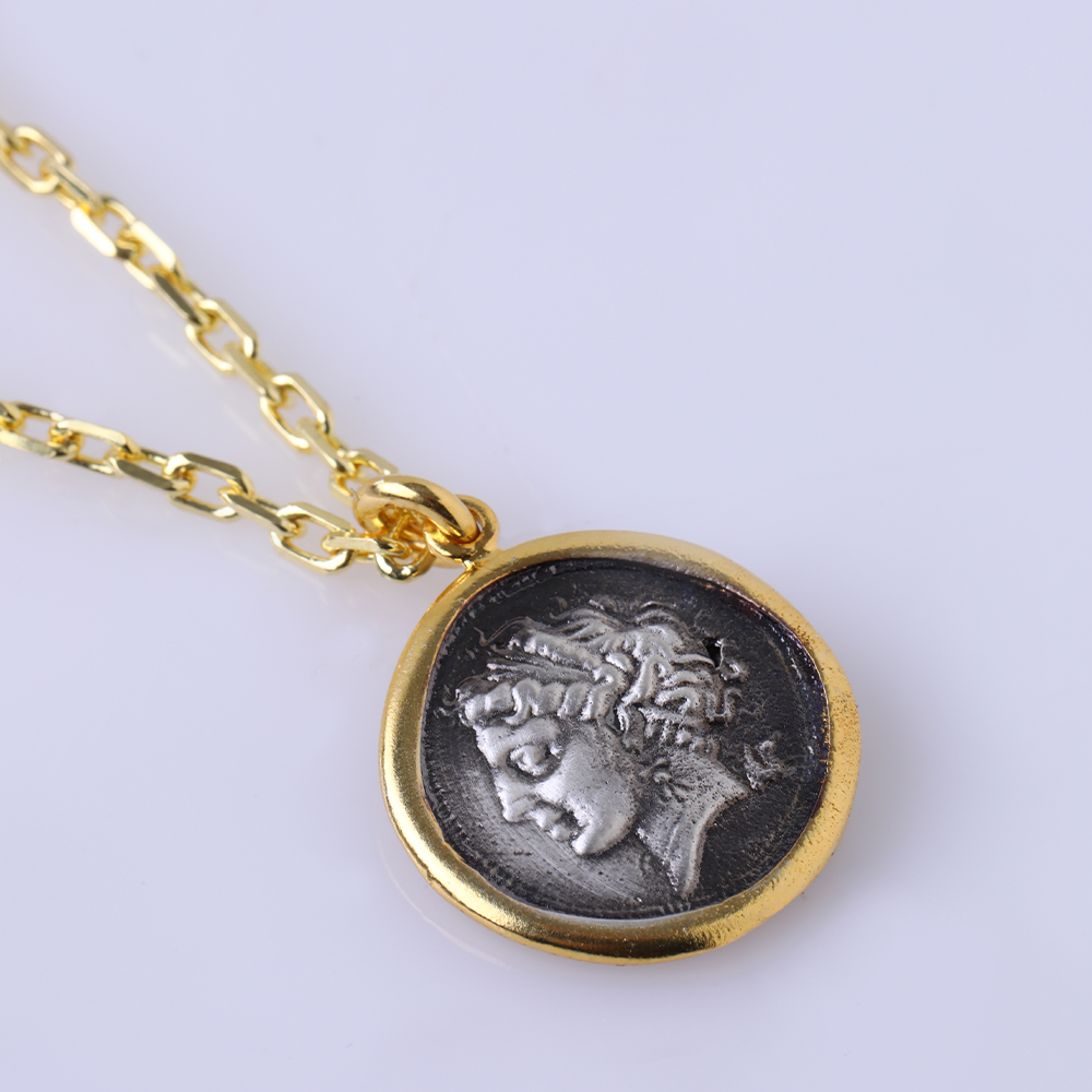 The Campania Neapolis Coin Pendant-A hand-sculpted 22K Gold Vermeil cast. Get this designer jewellery piece at only at The Luxe Maison. Shop now!